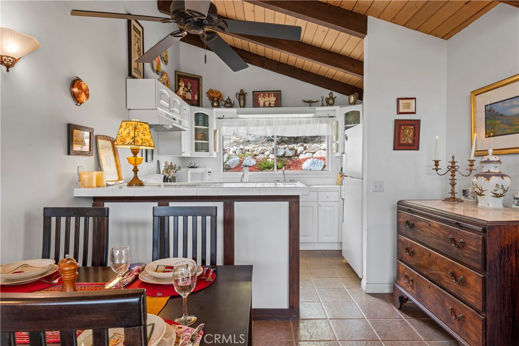 705 Cypress Road Cedar Glen, CA 92321 - Photo 10 of 51 a view of a dining area with furniture and chandelier