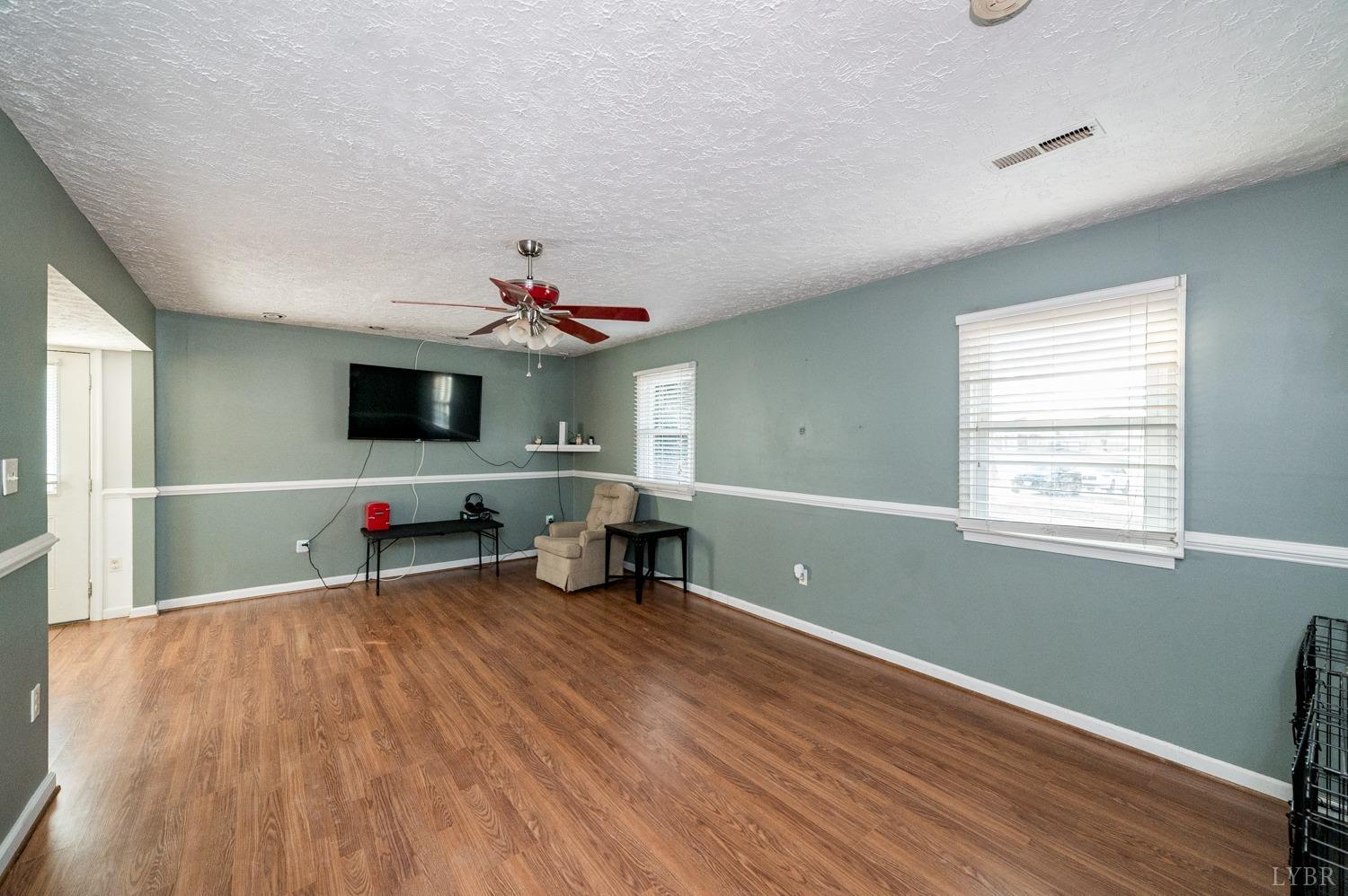 2271 Sunburst Road Evington, VA 24550 - Photo 17 of 26 a view of a livingroom with workspace and a window