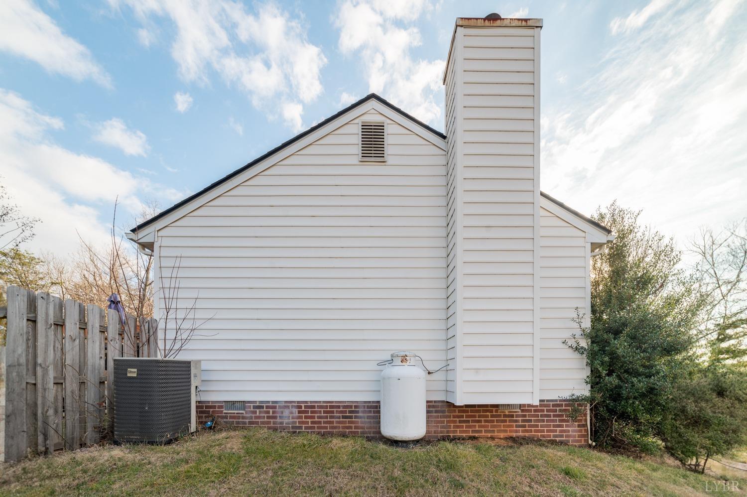 2271 Sunburst Road Evington, VA 24550 - Photo 23 of 26 a front view of a house with a yard