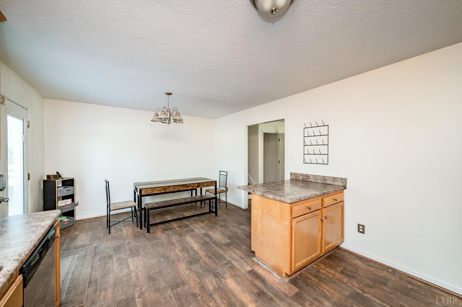 2271 Sunburst Road Evington, VA 24550 - Photo 7 of 26 a view of a workspace with furniture