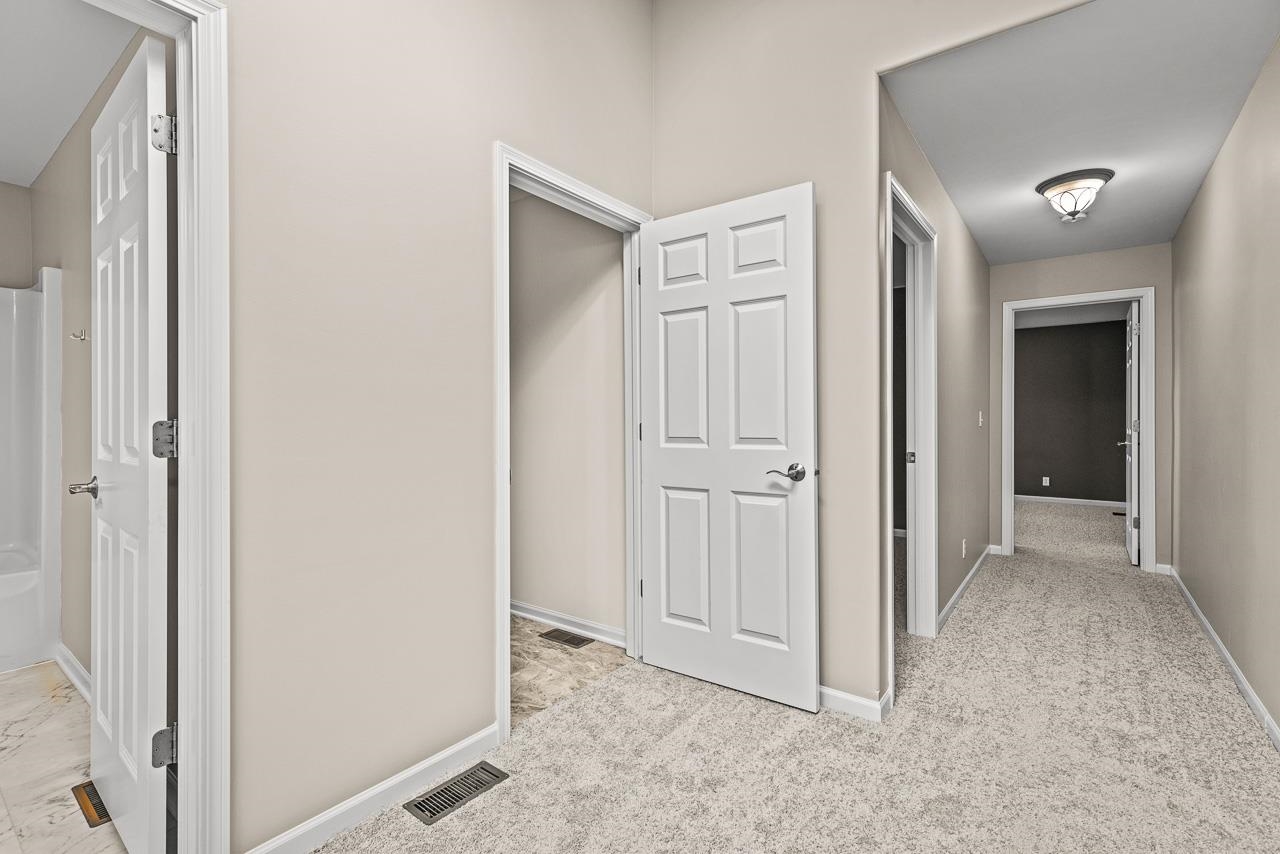 217 Market Street Genoa, IL 60135 - Photo 11 of 32 a view of a hallway with closet area