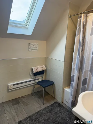 a kitchen with stainless steel appliances granite countertop wooden cabinets a stove top oven a sink and dishwasher