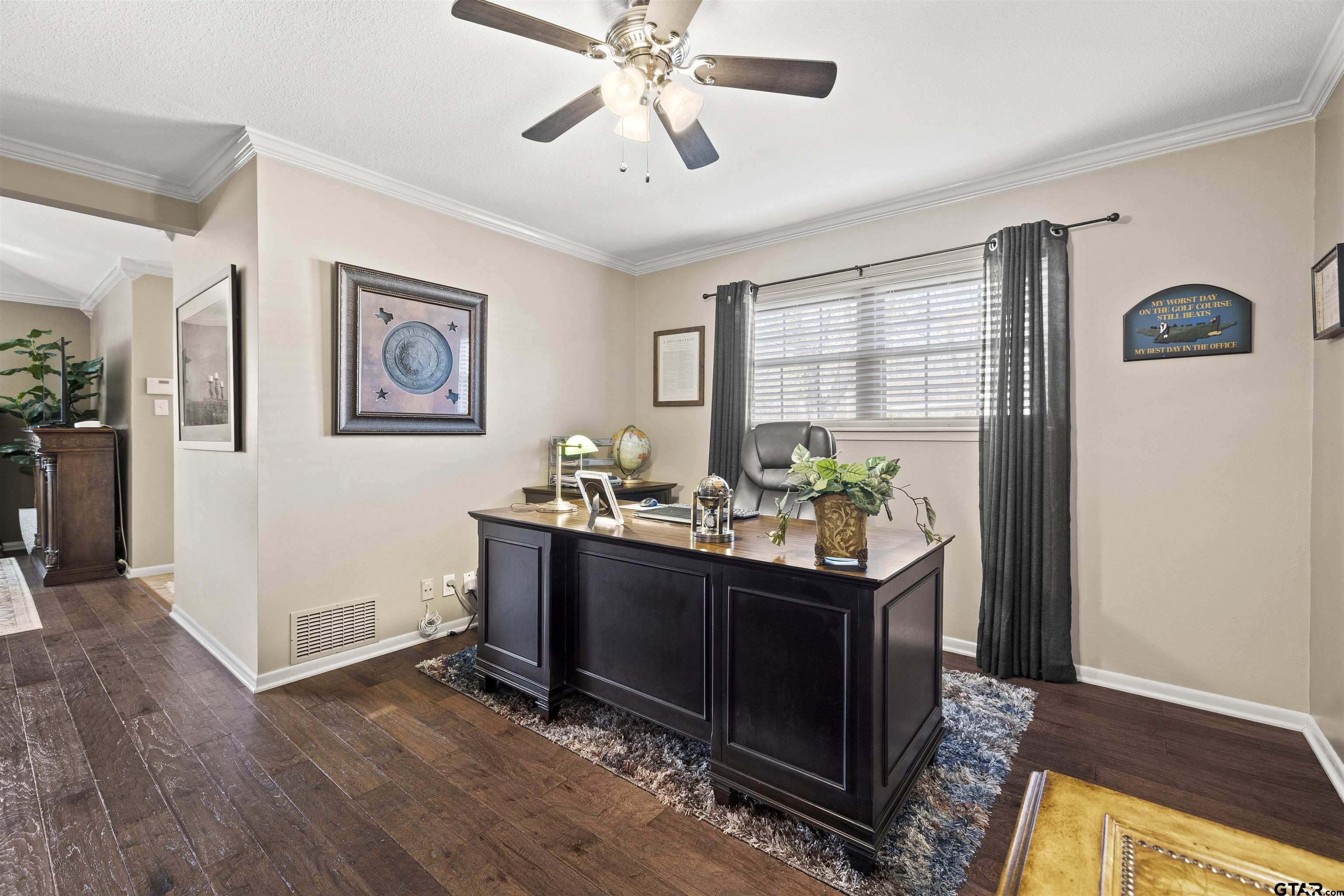 8235 Baylor Drive Tyler, TX 75703 - Photo 16 of 31 a view of a workspace with furniture and wooden floor