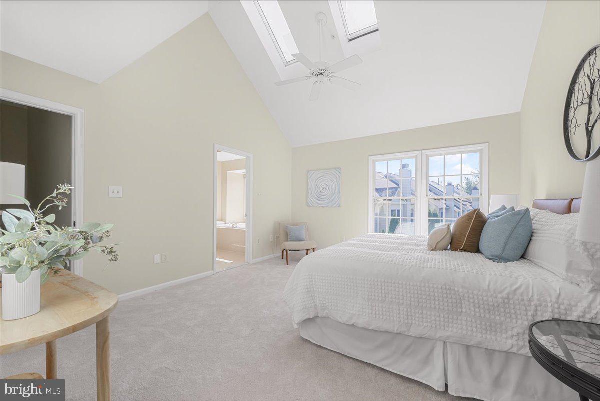 12664 Granite Ridge Drive North Potomac, MD 20878 - Photo 16 of 37 a large white bed in a white room