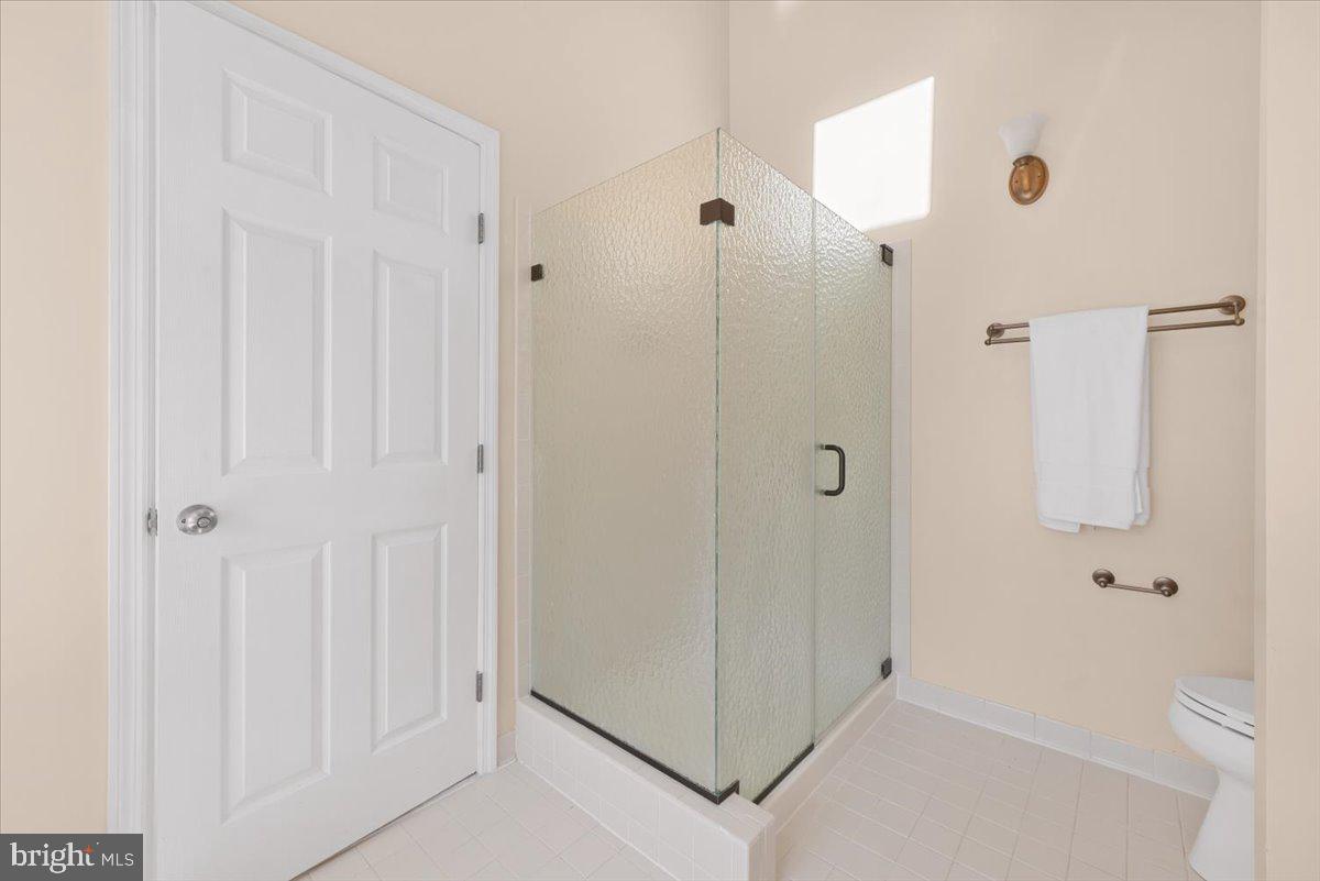 12664 Granite Ridge Drive North Potomac, MD 20878 - Photo 19 of 37 a bathroom with a shower