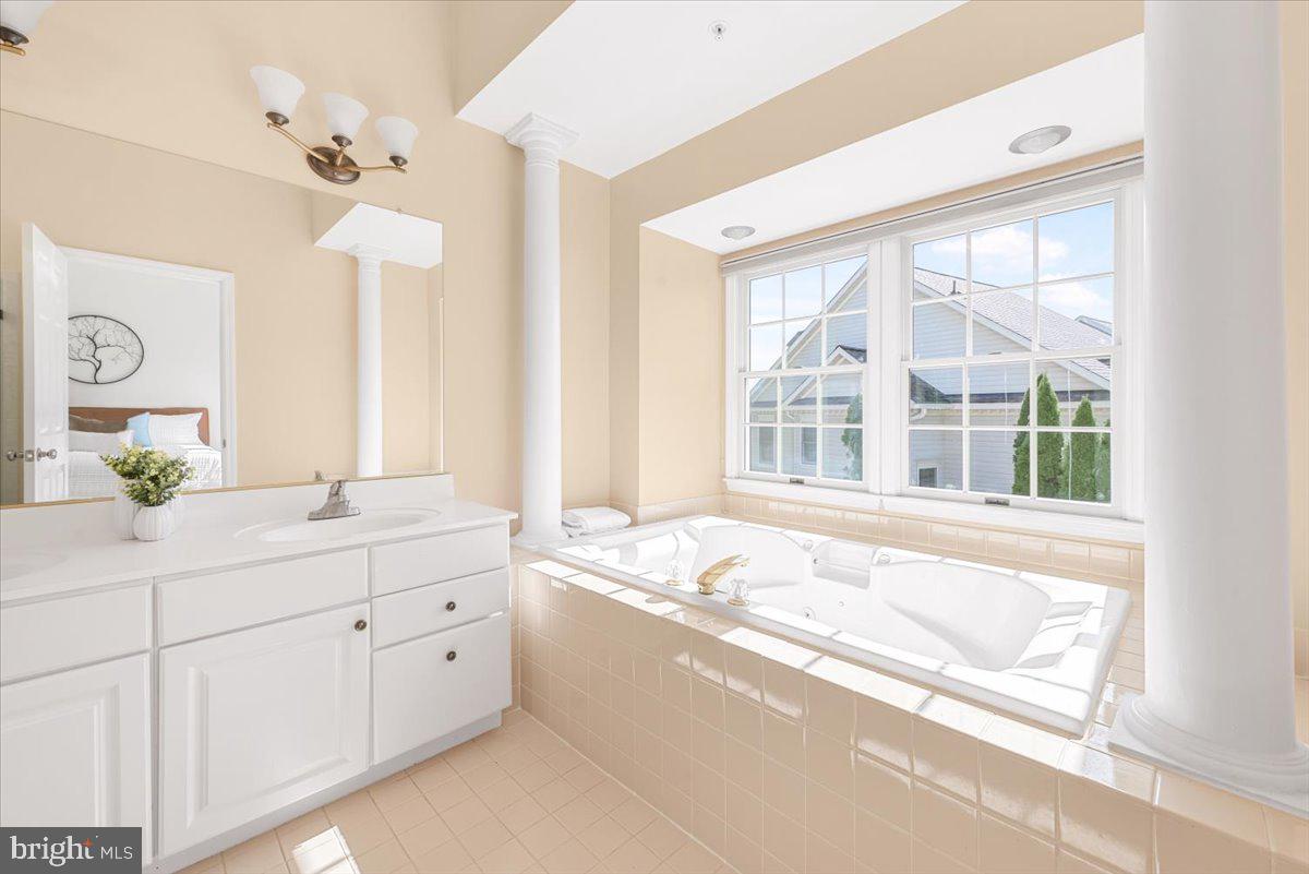 12664 Granite Ridge Drive North Potomac, MD 20878 - Photo 20 of 37 a bathroom with a sink and a bathtub