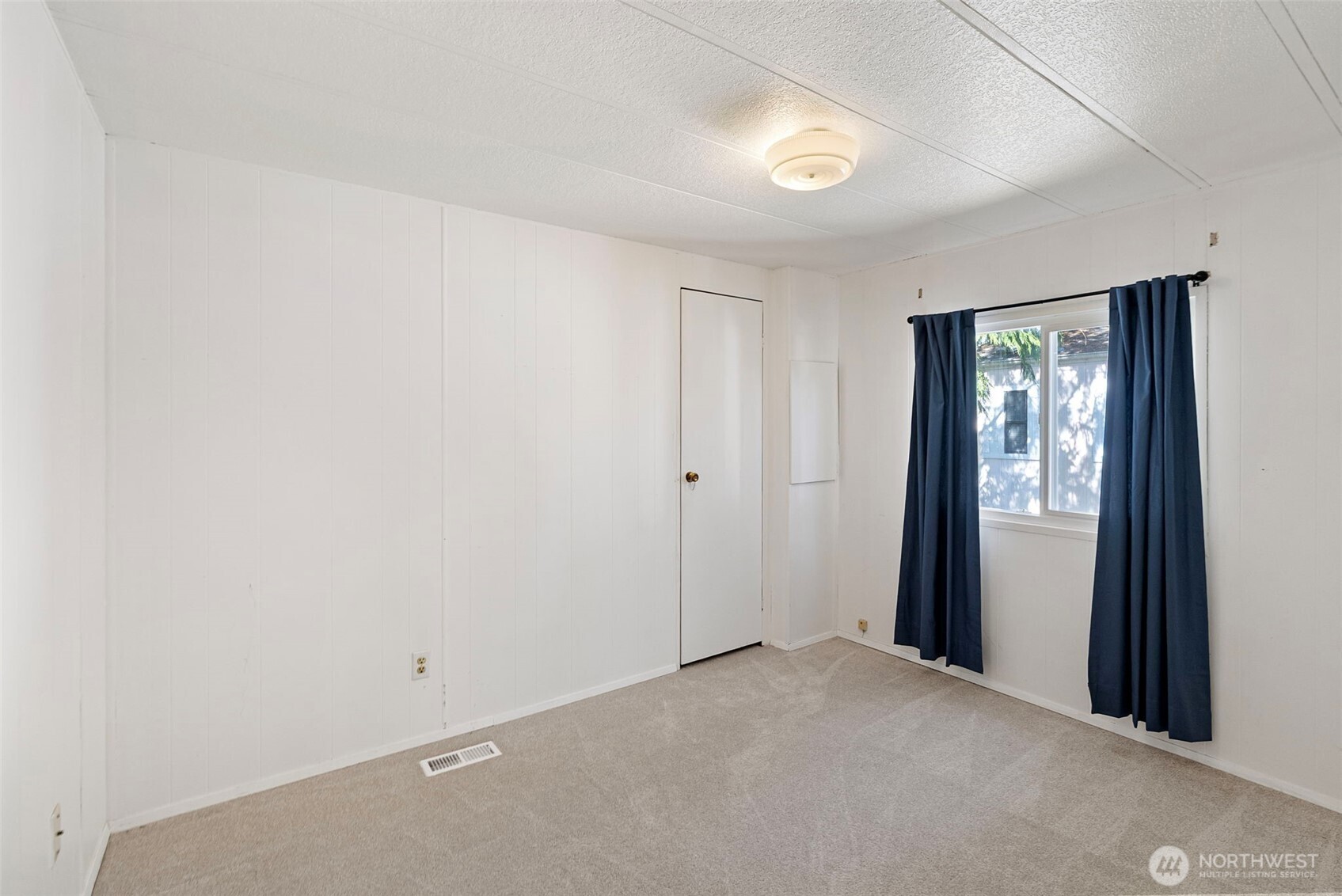 2200 196th Street Southeast, Unit 43 Bothell, WA 98012 - Photo 13 of 31 a view of an empty room and window