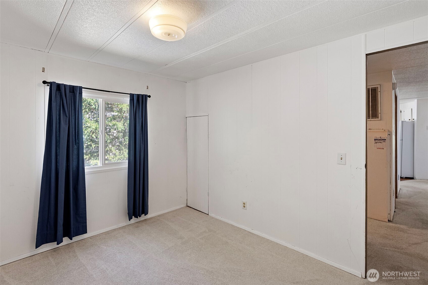 2200 196th Street Southeast, Unit 43 Bothell, WA 98012 - Photo 14 of 31 a view of an empty room with a window