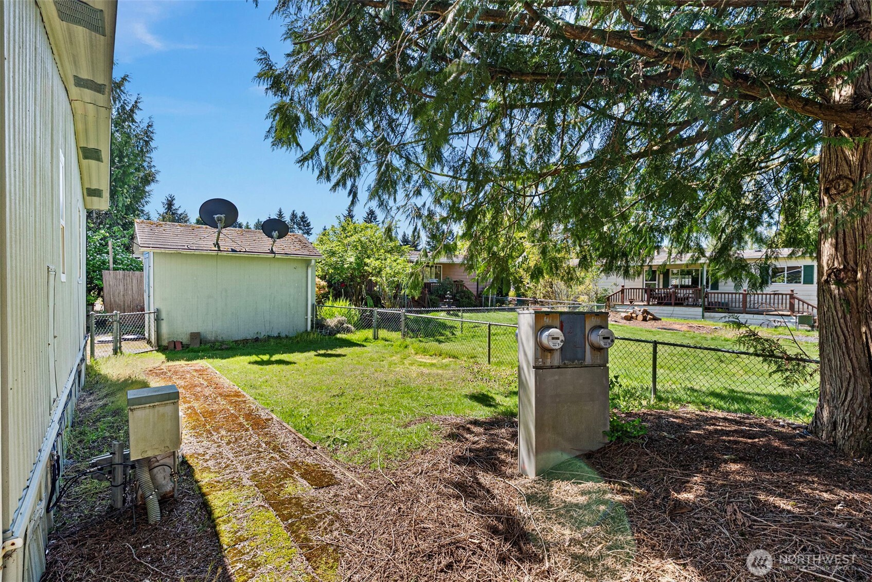 2200 196th Street Southeast, Unit 43 Bothell, WA 98012 - Photo 19 of 31 a front view of a house with a yard