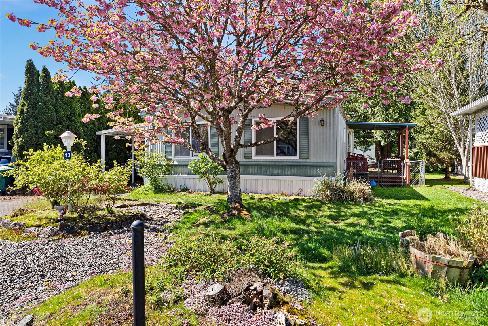 2200 196th Street Southeast, Unit 43 Bothell, WA 98012 - Photo 31 of 31 a front view of a house with a yard