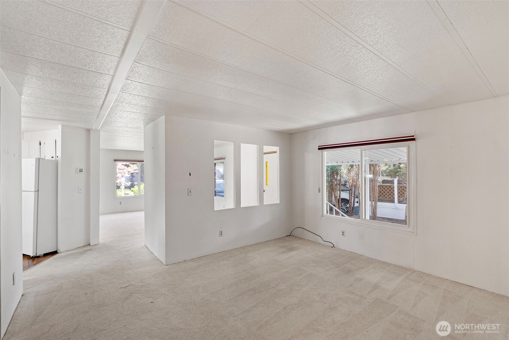 2200 196th Street Southeast, Unit 43 Bothell, WA 98012 - Photo 8 of 31 an empty room with windows