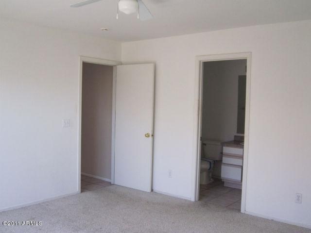 7975 West Hatcher Road Peoria, AZ 85345 - Photo 12 of 16 Master bedroom