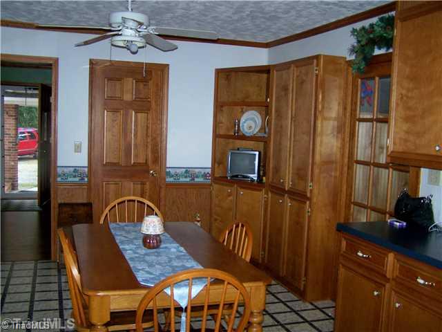 263 Salem Road Lexington, NC 27295 - Photo 4 of 10 Kitchen. Beautiful Wood Cabinetry in Kitchen This Home also Features Some Pocket Doors As Well!!