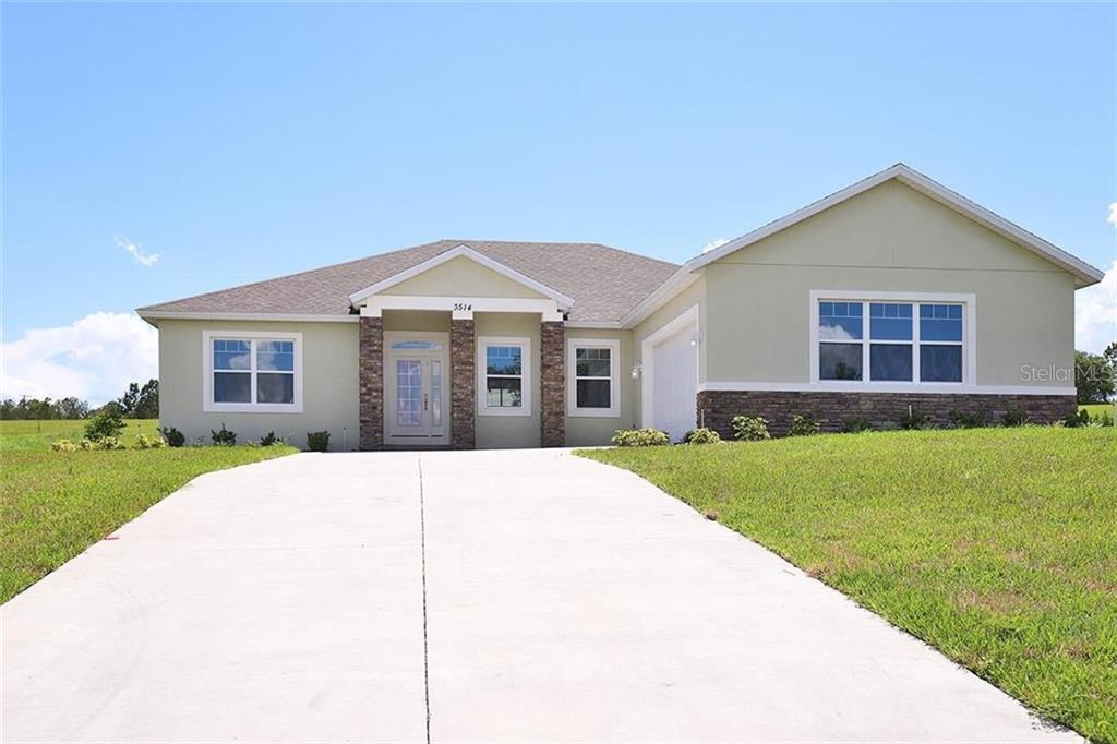 CUSTOM BUILT HOME FEATURING 5 BEDROOMS AND 3 BATHS