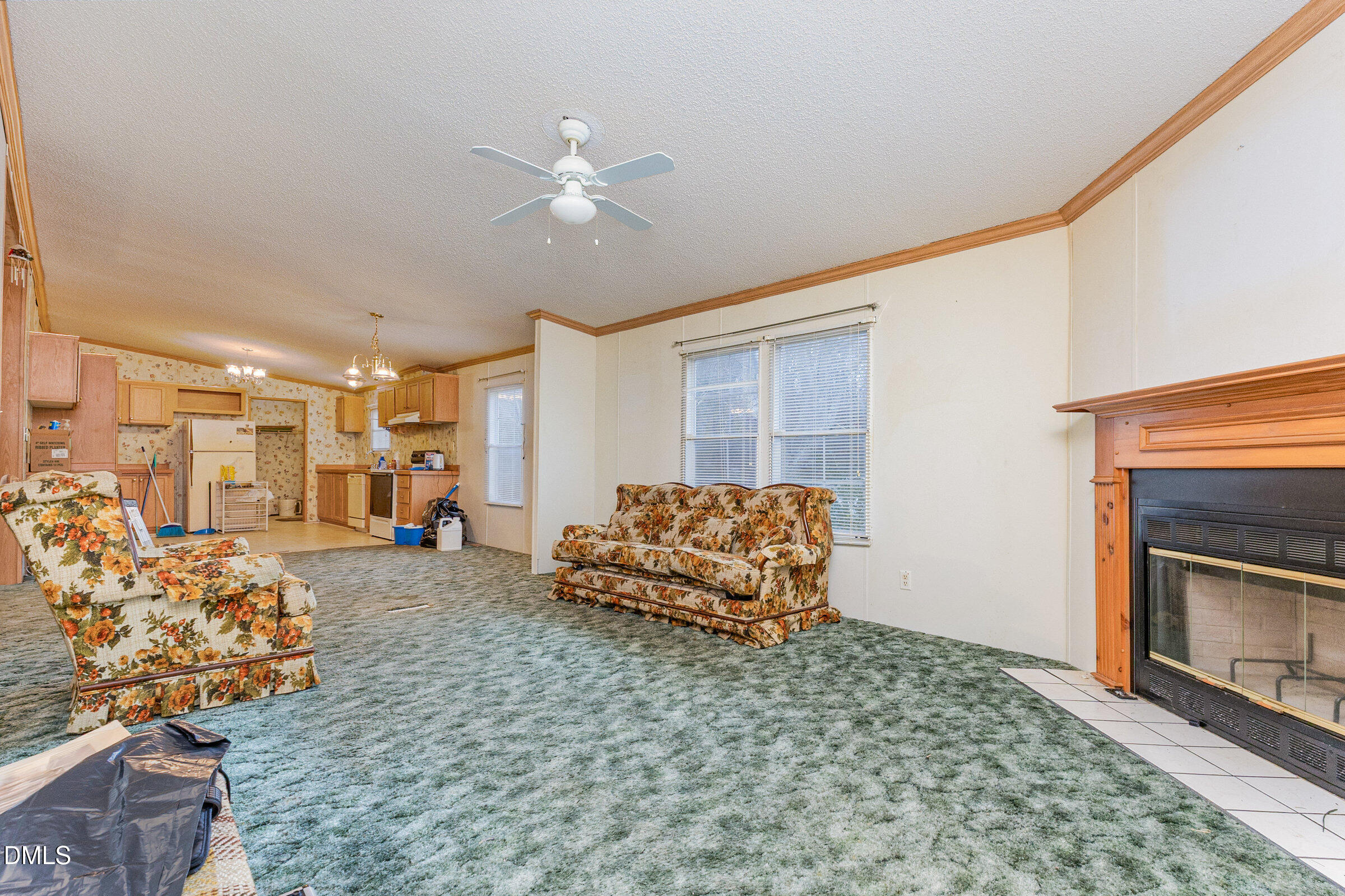 7472 Edwards Road Castalia, NC 27816 - Photo 20 of 36 a bedroom with furniture and a fireplace