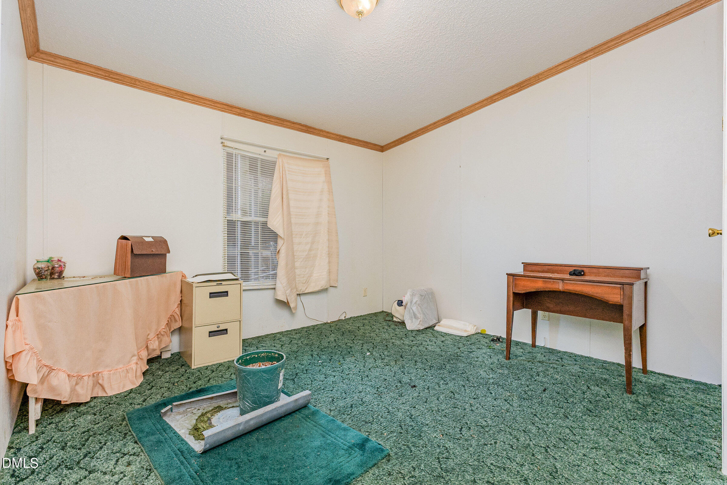 7472 Edwards Road Castalia, NC 27816 - Photo 25 of 36 a living room with furniture and a window