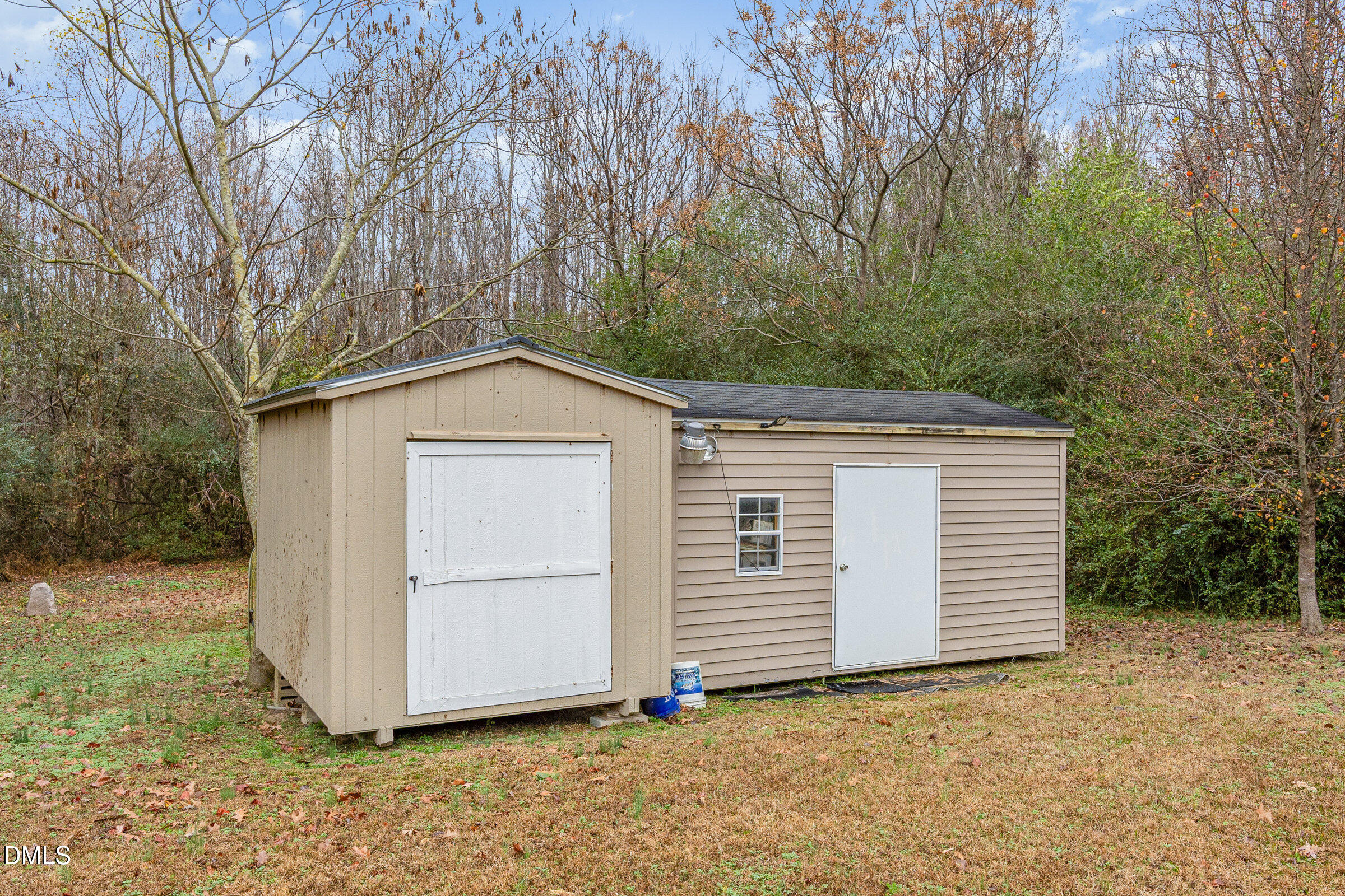 7472 Edwards Road Castalia, NC 27816 - Photo 32 of 36 a view of a house with a yard and garage