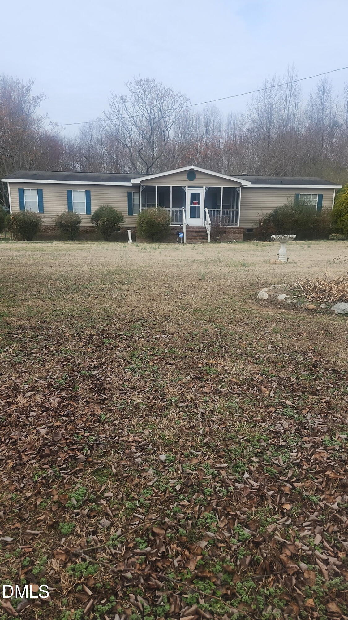 7472 Edwards Road Castalia, NC 27816 - Photo 5 of 36 a view of a house with a yard