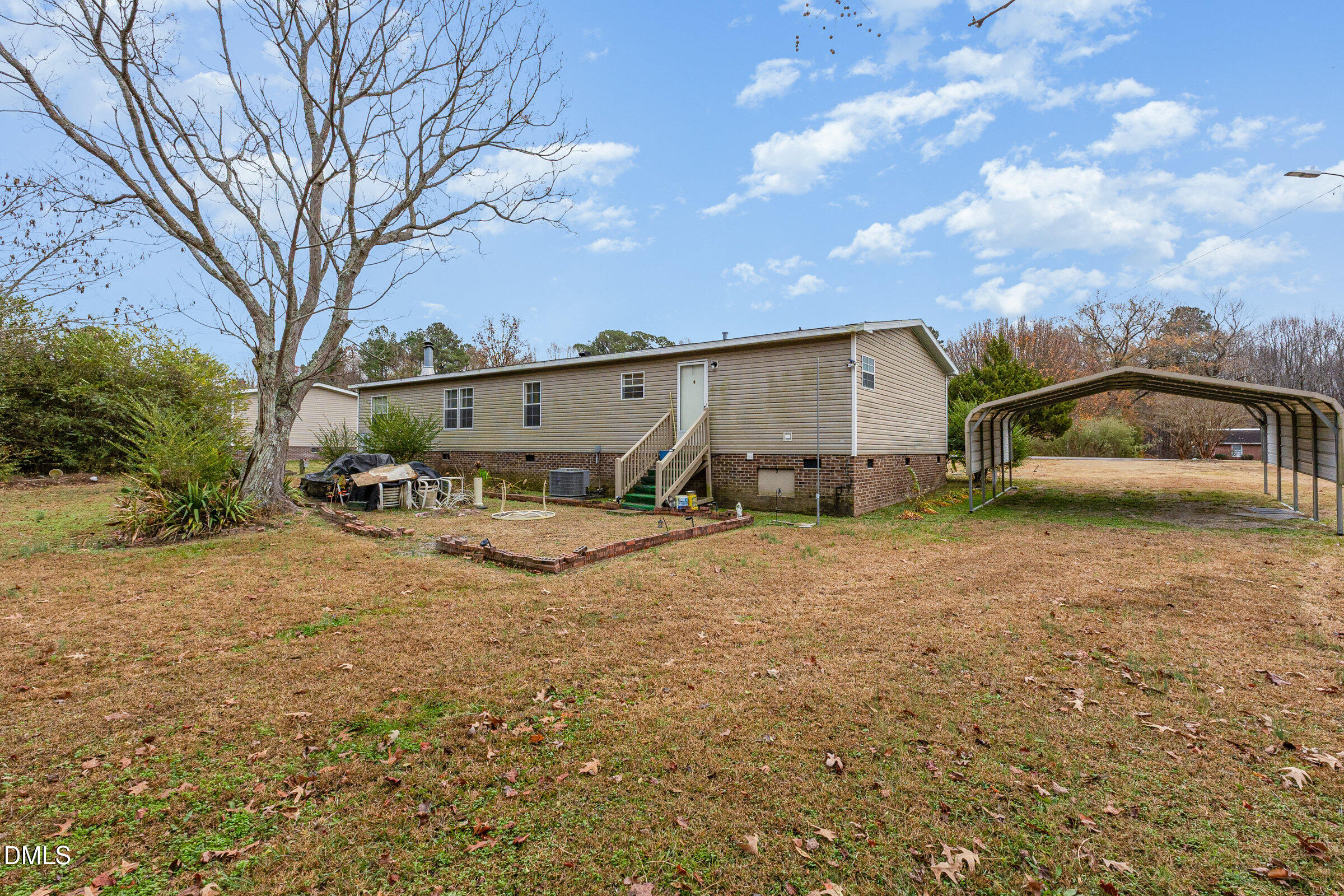 7472 Edwards Road Castalia, NC 27816 - Photo 6 of 36 a view of a car park in front of house
