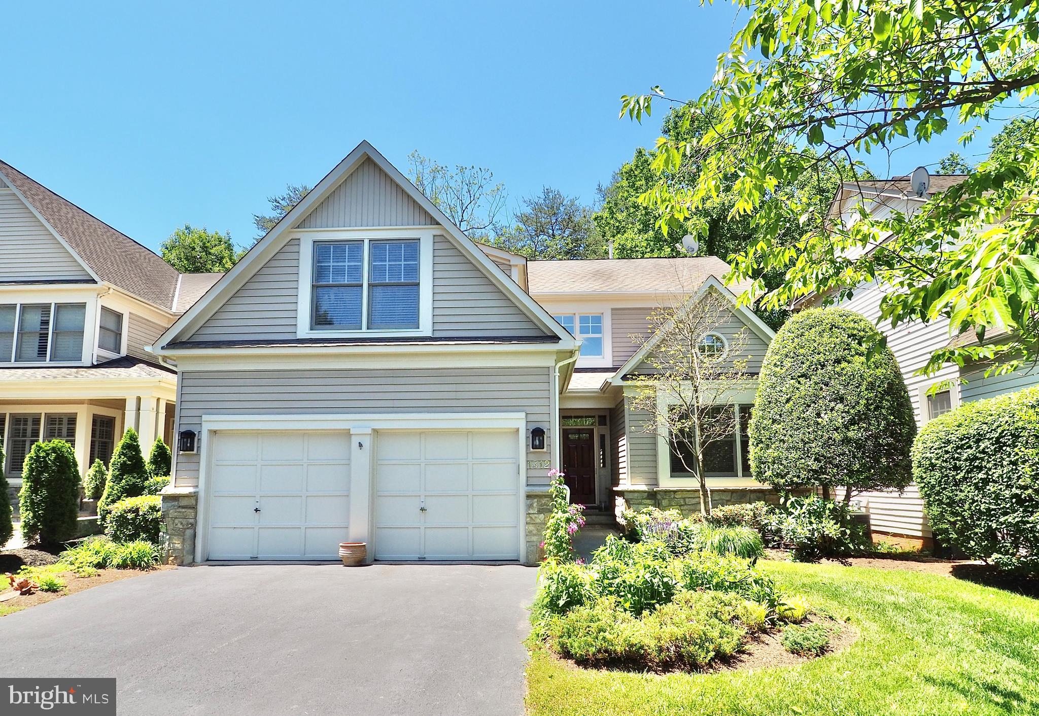1312 Red Hawk Circle Reston, VA 20194 - Photo 3 of 48 Two-car garage with ample room for parking