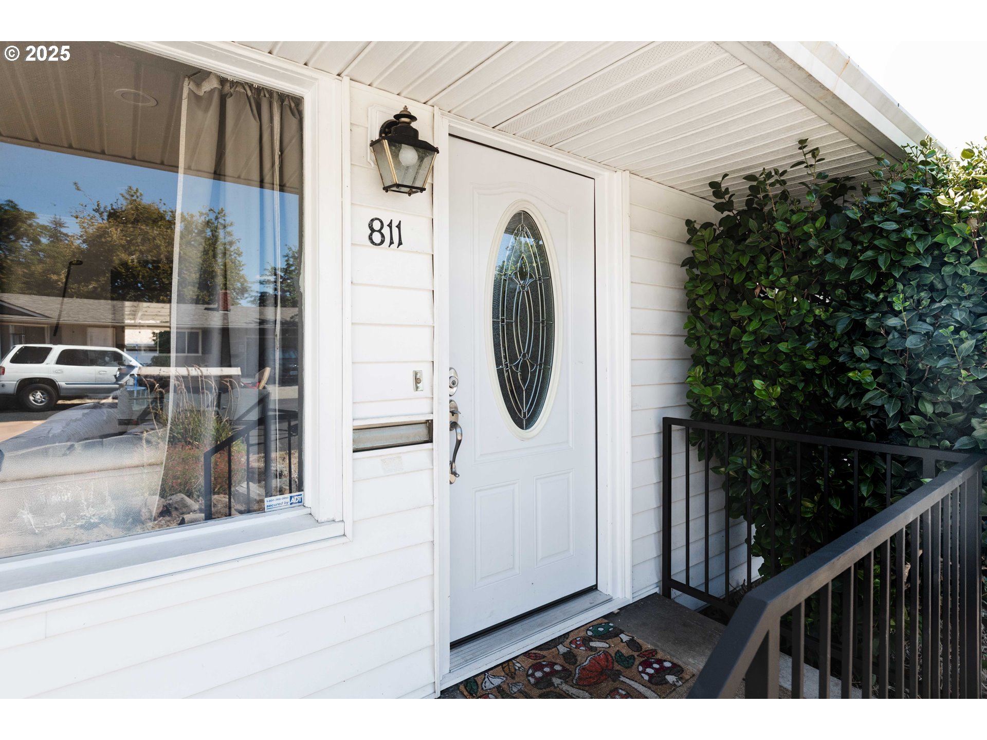 811 Northeast Clyde Place, Unit 116C Grants Pass, OR 97526 - Photo 19 of 37 a view of a house with backyard and porch