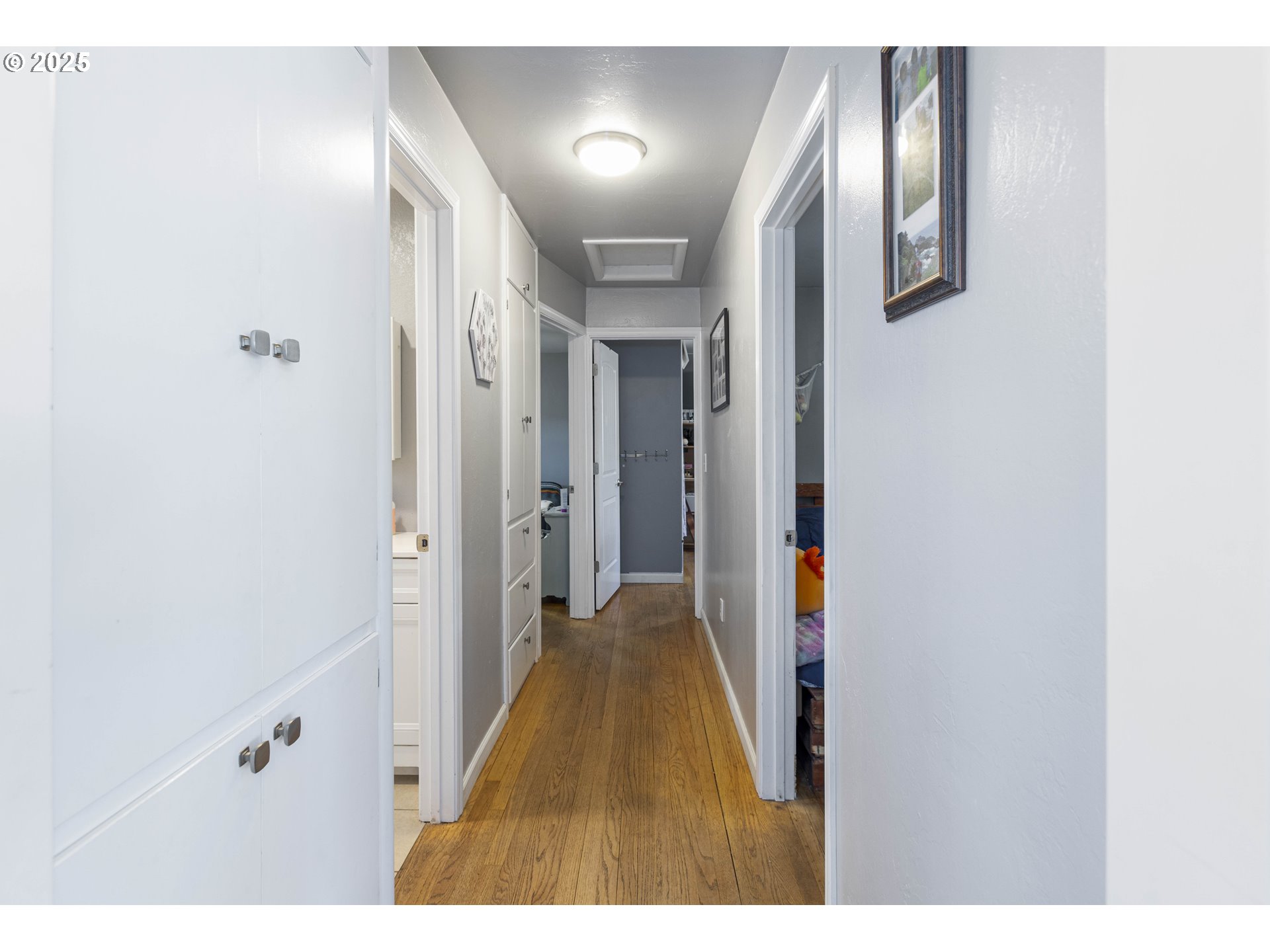 811 Northeast Clyde Place, Unit 116C Grants Pass, OR 97526 - Photo 20 of 37 a view of a hallway with wooden floor