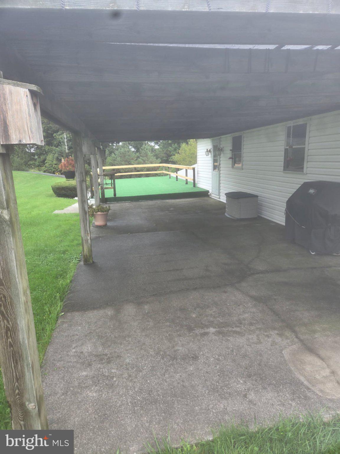 7620 Spring Road New Bloomfield, PA 17068 - Photo 39 of 45 REAR COVERED PORCH