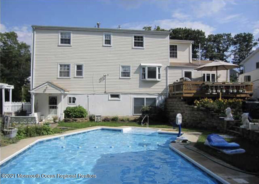 1144 Aldrich Road Jackson, NJ 08527 - Photo 3 of 24 a front view of house with yard and outdoor seating
