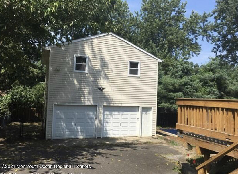 1144 Aldrich Road Jackson, NJ 08527 - Photo 22 of 24 a view of a house with a yard