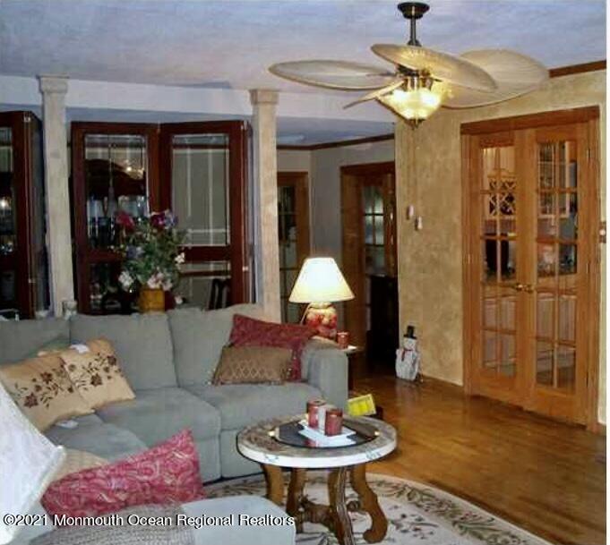 1144 Aldrich Road Jackson, NJ 08527 - Photo 5 of 24 a living room with furniture and chandelier