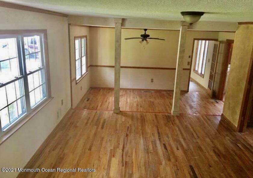 1144 Aldrich Road Jackson, NJ 08527 - Photo 8 of 24 a view of a room with wooden floor and a window