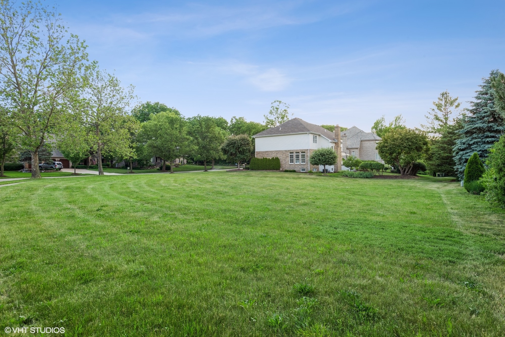 2908 Turnberry Road St. Charles, IL 60174 - Photo 10 of 10 a view of a green field with trees in the background