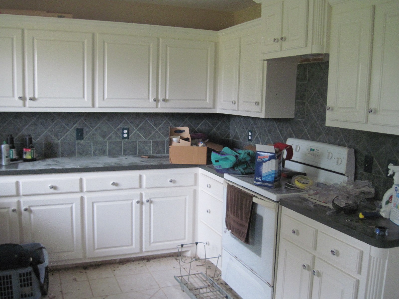 4129 Farm To Market 524 Road Sweeny, TX 77480 - Photo 18 of 28 a kitchen with white cabinets and white appliances