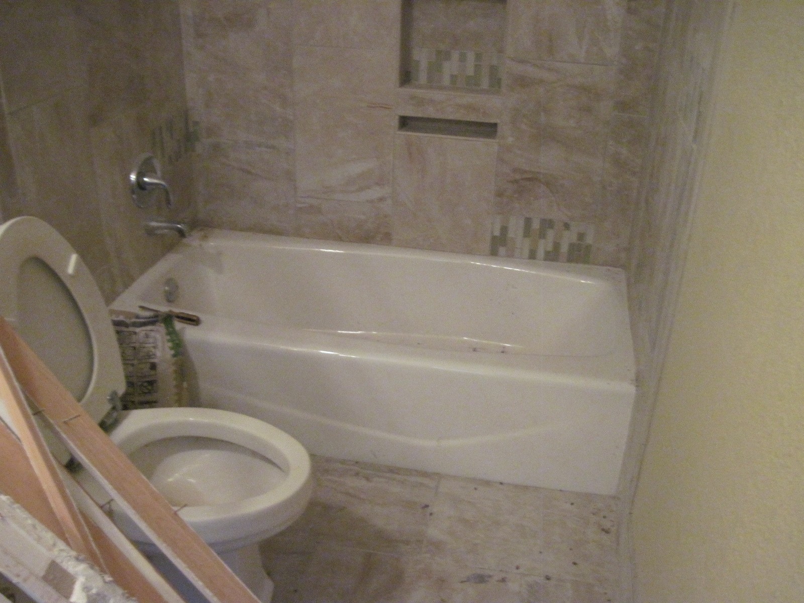 4129 Farm To Market 524 Road Sweeny, TX 77480 - Photo 26 of 28 a bath tub sitting next to a white toilet