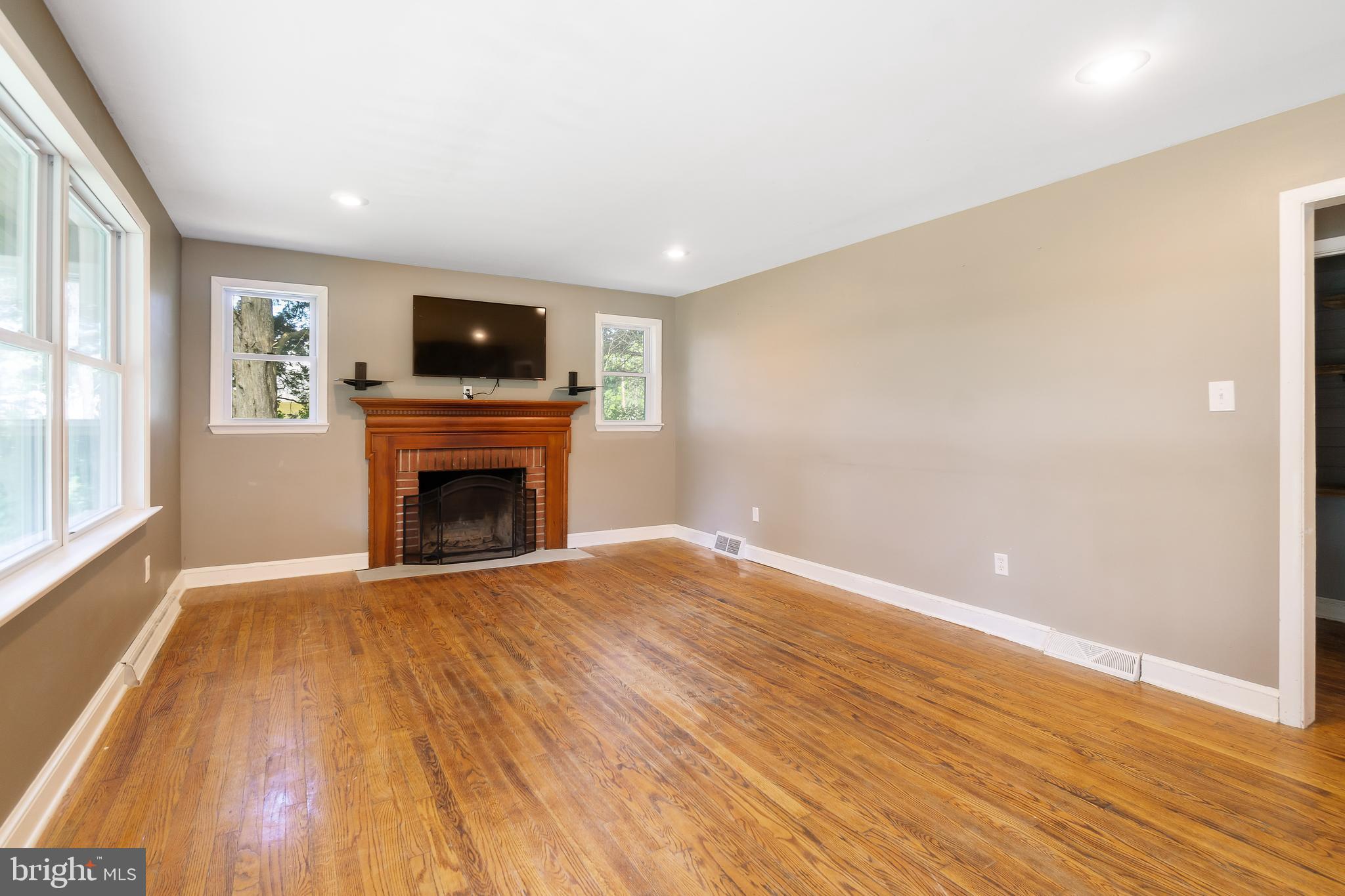 4815 Telegraph Road Elkton, MD 21921 - Photo 6 of 26 Wood burning fireplace in family room.