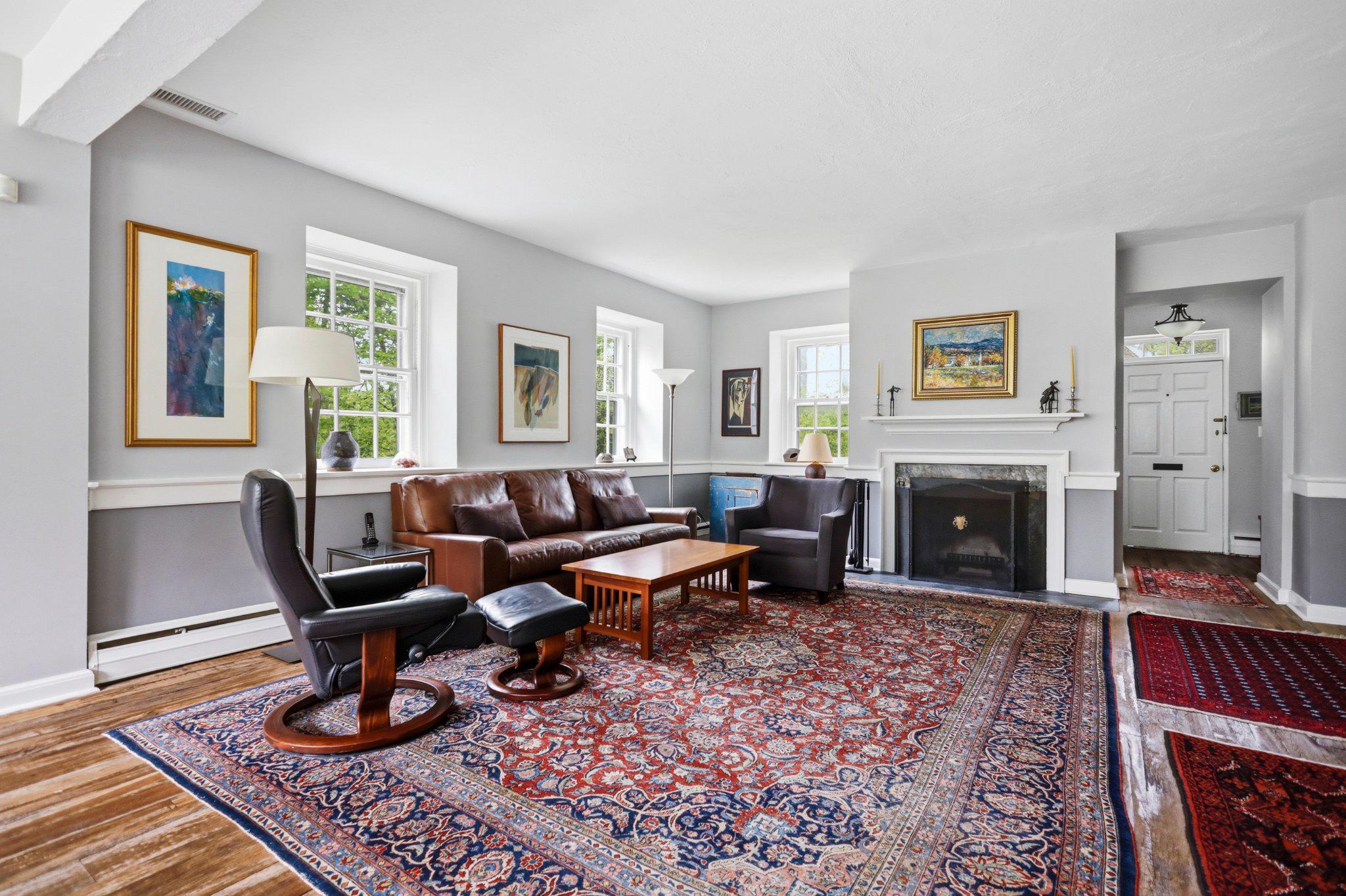 91 East Bells Mill Road Philadelphia, PA 19118 - Photo 6 of 29 Bright and inviting living space with fireplace