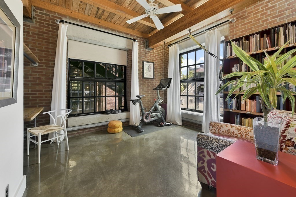 30 Howard Street, Unit 1 Somerville, MA 02144 - Photo 23 of 32 a view of a chairs and table in the patio