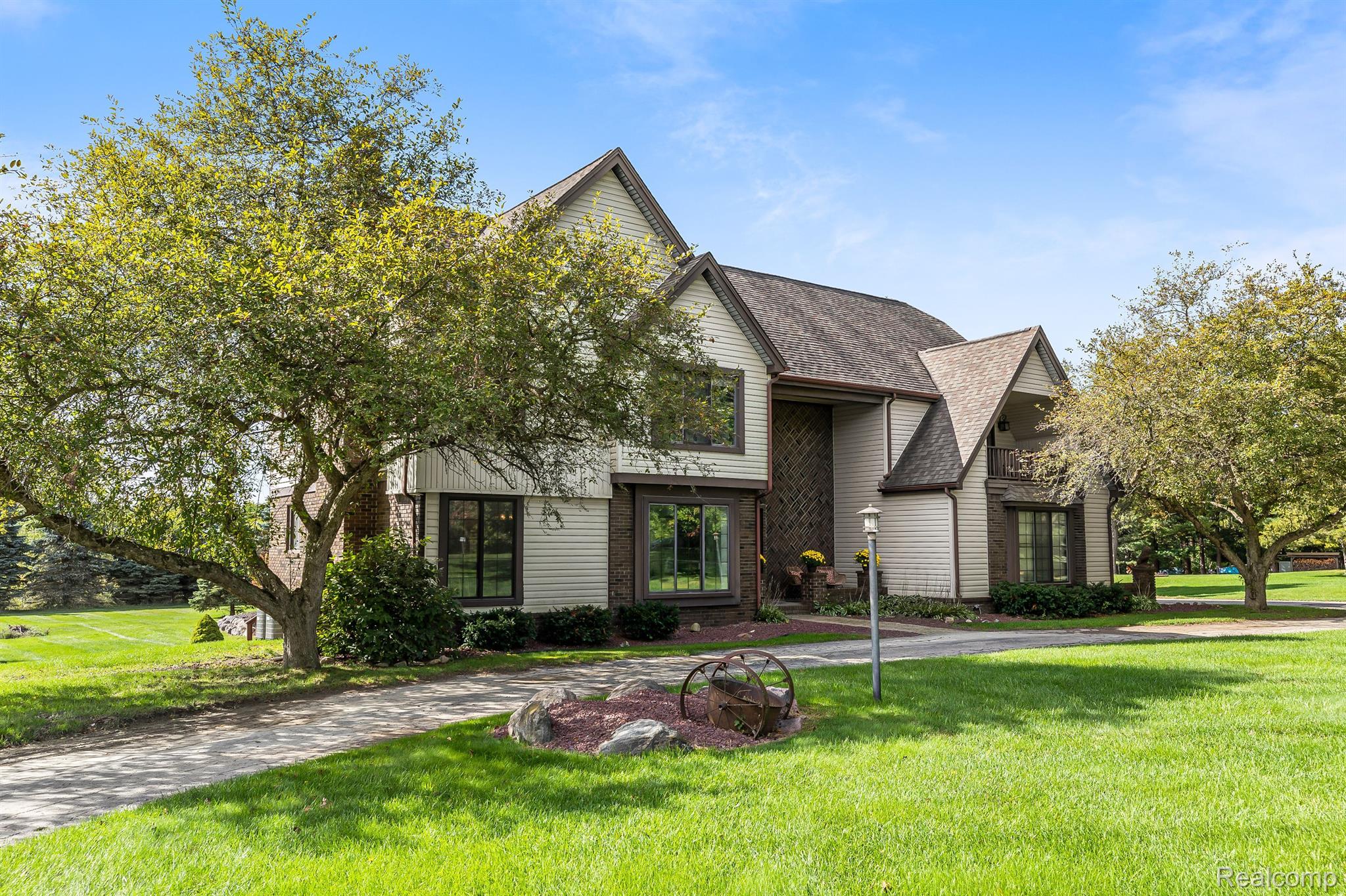 12456 Larkins Road Brighton, MI 48114 - Photo 44 of 62 Pristine lawn and mature trees.