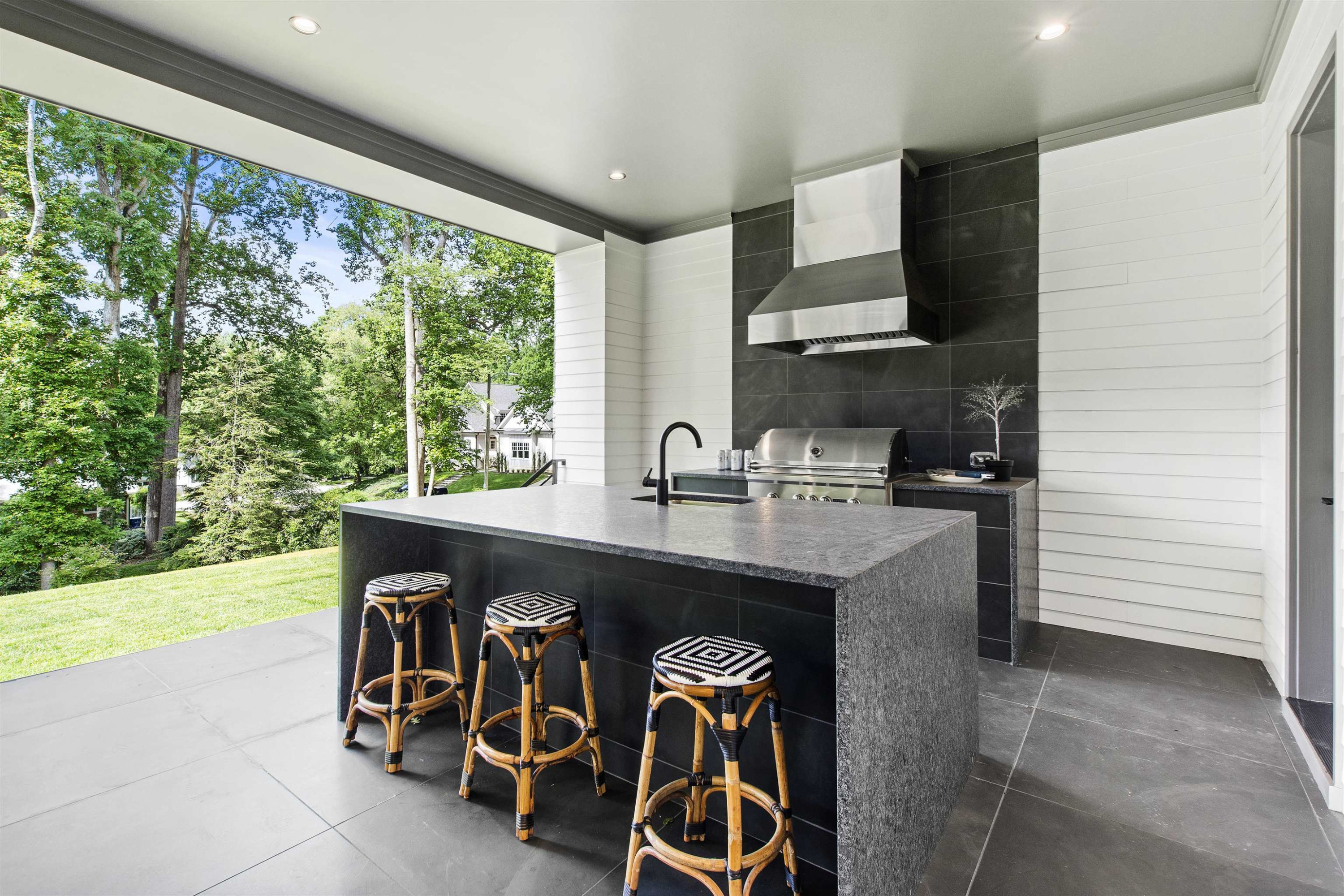 3340 Hampton Road Raleigh, NC 27607 - Photo 58 of 66 The outdoor kitchen has great seating at the island countertop. Outdoor Kitchen