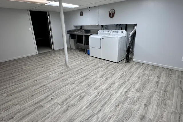 a view of an empty room with glass door
