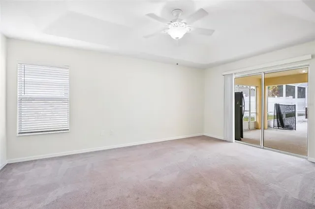 a bathroom with a bathtub shower and toilet