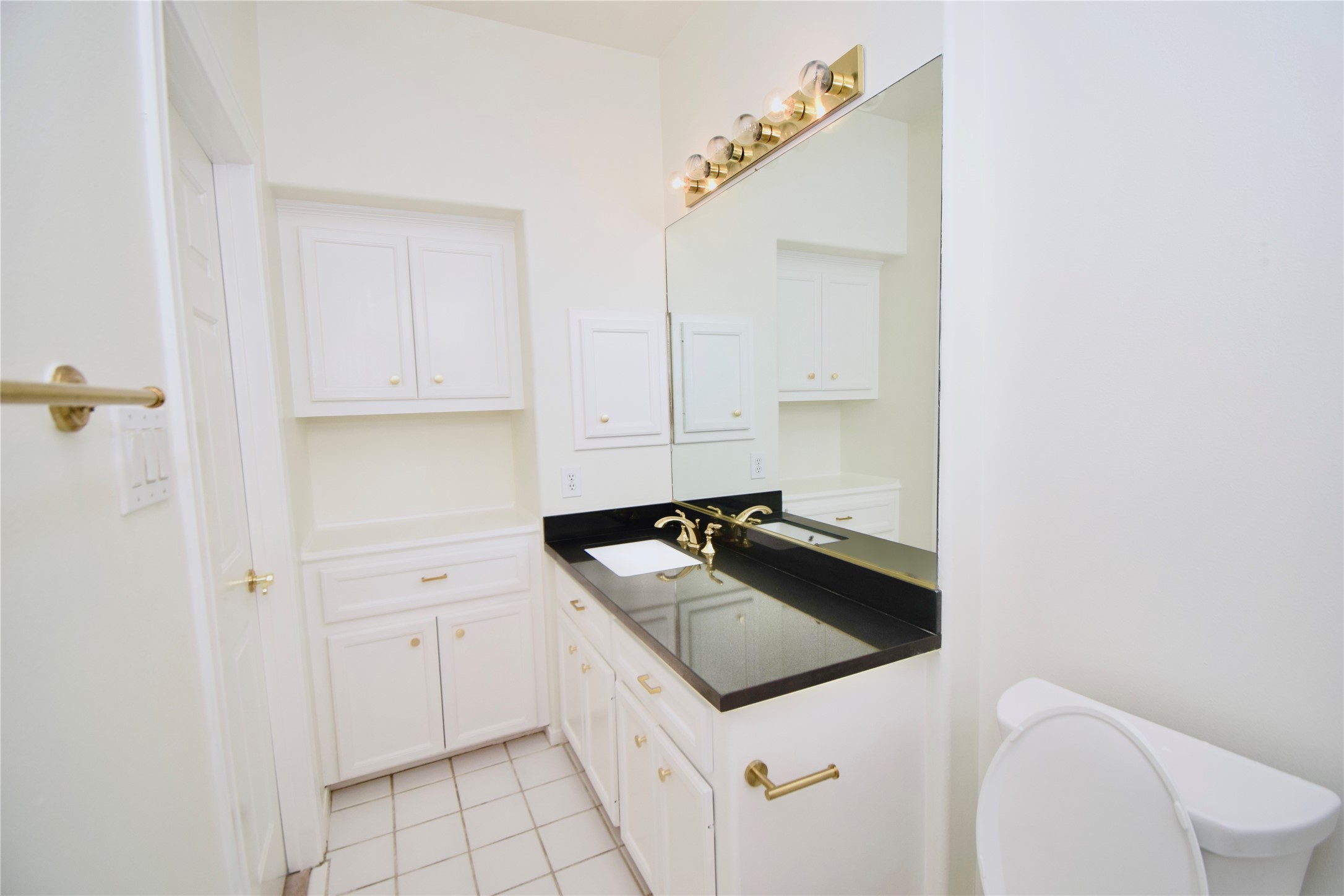 2024 Welch Street Houston, TX 77019 - Photo 15 of 18 a utility room with sink dryer and washer