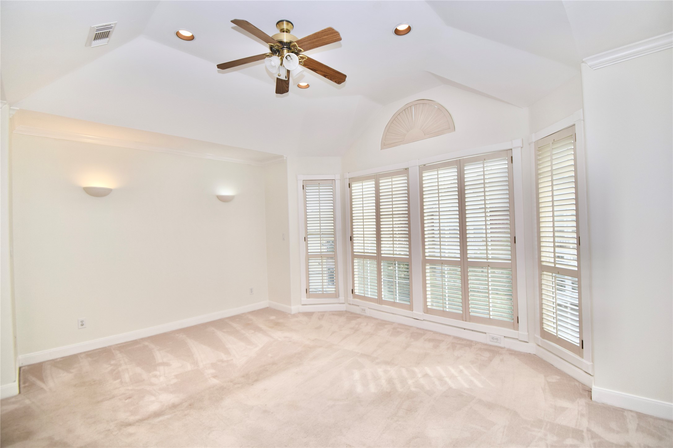 2024 Welch Street Houston, TX 77019 - Photo 8 of 18 a view of an empty room with a window