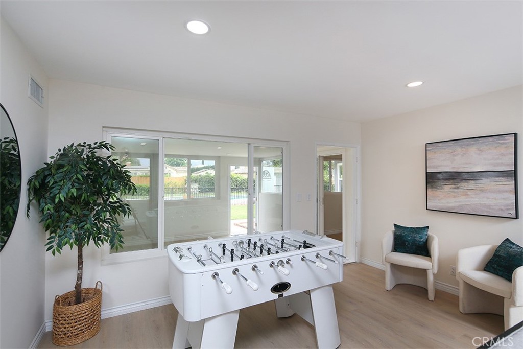 255 Sharon Road Arcadia, CA 91007 - Photo 11 of 29 a living room with furniture potted plant and a large window