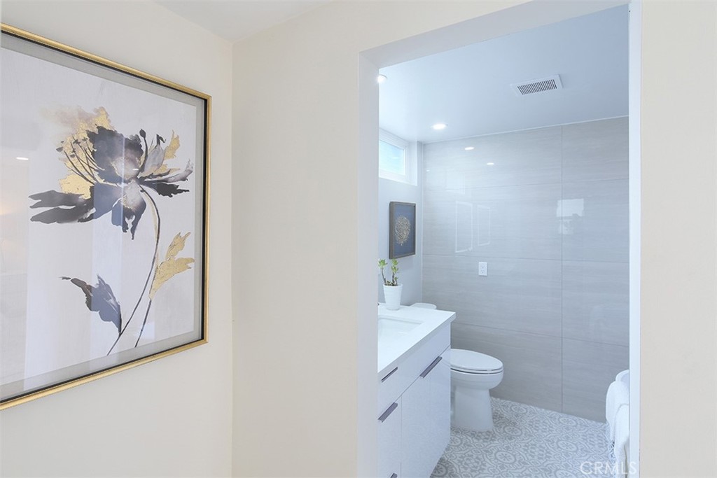 255 Sharon Road Arcadia, CA 91007 - Photo 15 of 29 a bathroom with a toilet sink and mirror