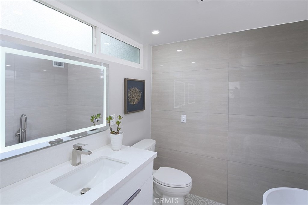 255 Sharon Road Arcadia, CA 91007 - Photo 16 of 29 a bathroom with a sink toilet and shower