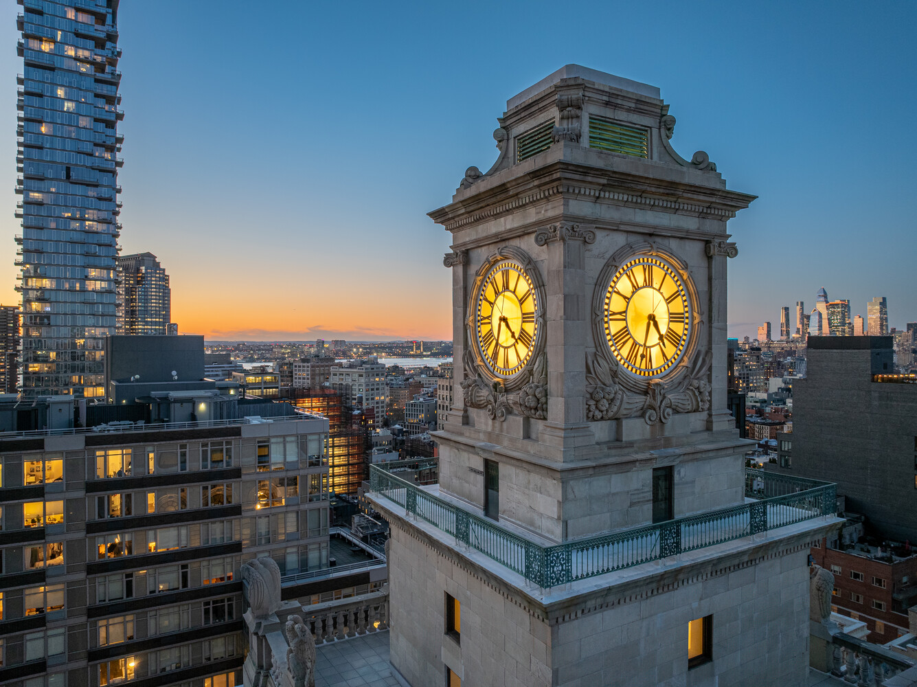 a view of a fireplace with a clock on the top