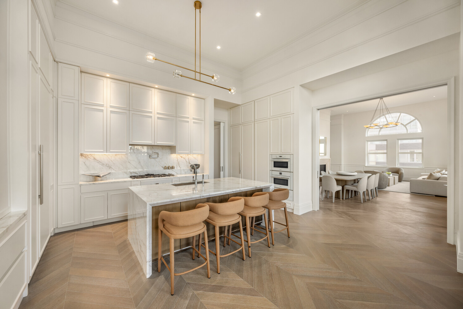 108 Leonard Street, Unit PHW Manhattan, NY 10013 - Photo 6 of 33 a large kitchen with a table and chairs
