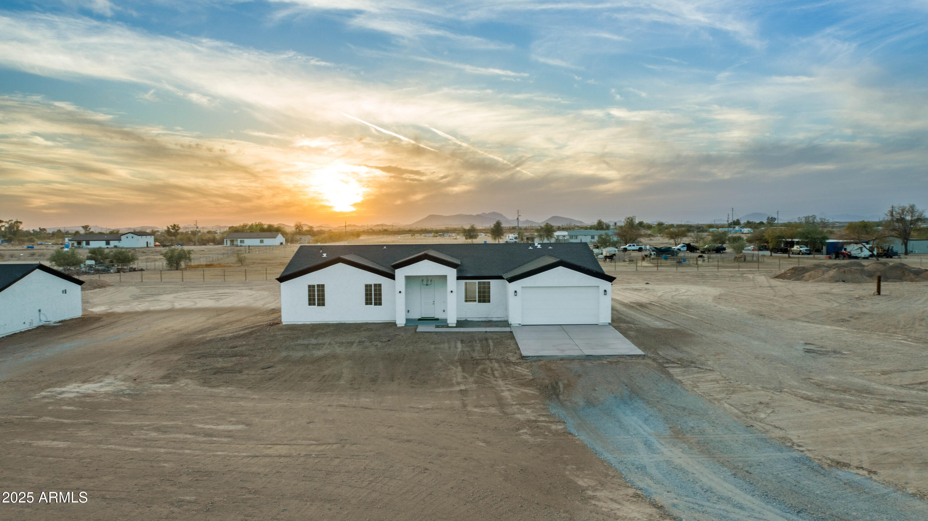 2103 Hassayampa Road Tonopah, AZ 85354 - Photo 14 of 37 an aerial view of a house with a yard and lake view