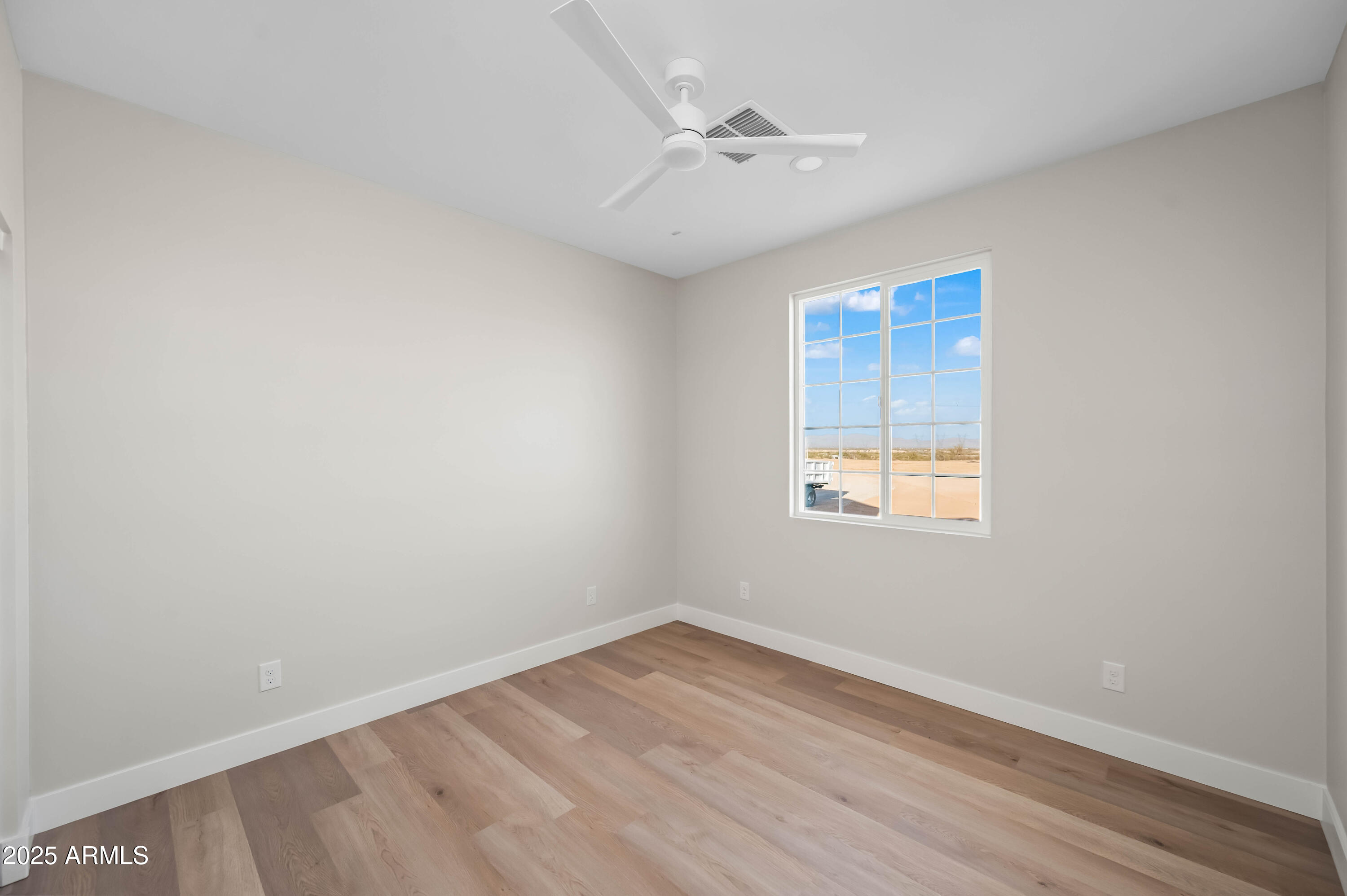 2103 Hassayampa Road Tonopah, AZ 85354 - Photo 17 of 37 an empty room with a window